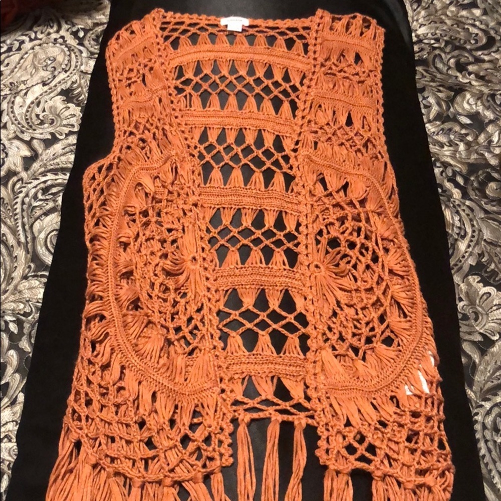 Throw over vest